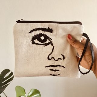"Mpone" canvas, hand embroidered utility purse.