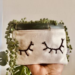 One line canvas hand embroidered fabric pots.