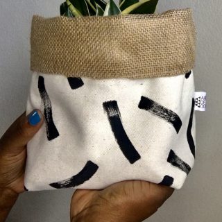 Hand painted canvas fabric pot.