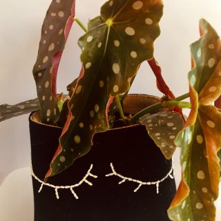 Black canvas hand embroidered lash fabric pot