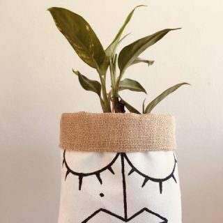 Kg hand painted fabric pot.